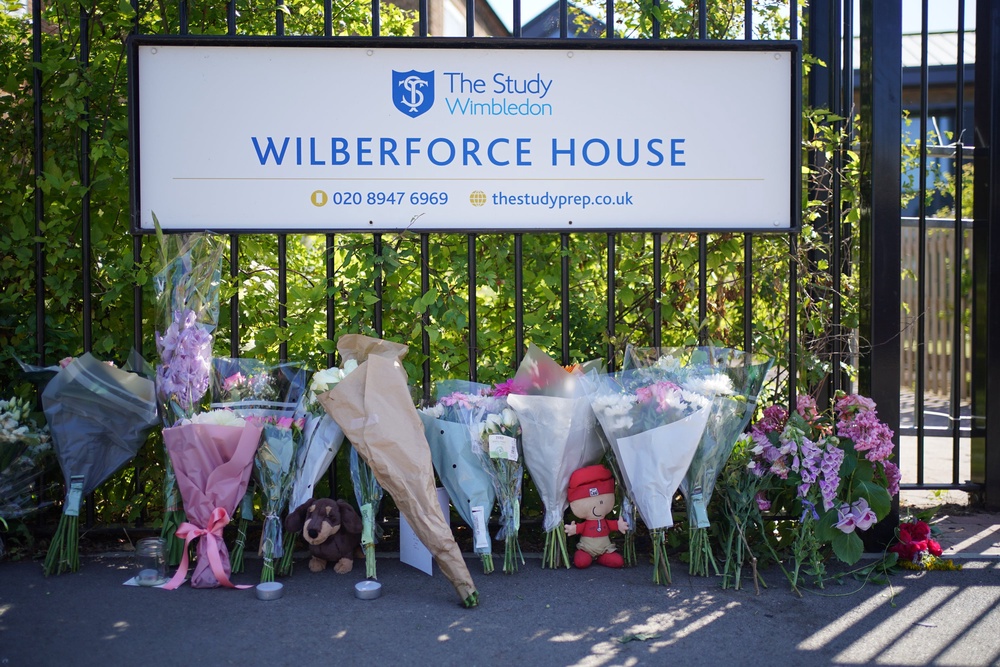Flowers and toys placed outside the Study Preparatory School in Wimbledon (Yui Mok/PA) (PA Archive)