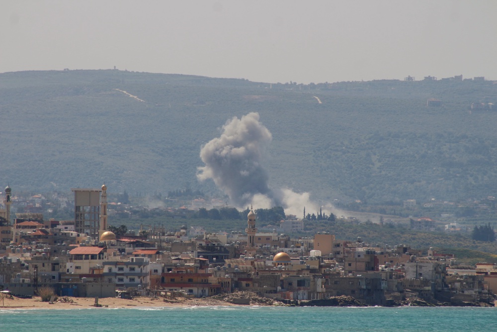 Smoke rises from the site of an Israeli airstrike that targeted an area in the southern Lebanese village of Qlaile (AFP/Getty)