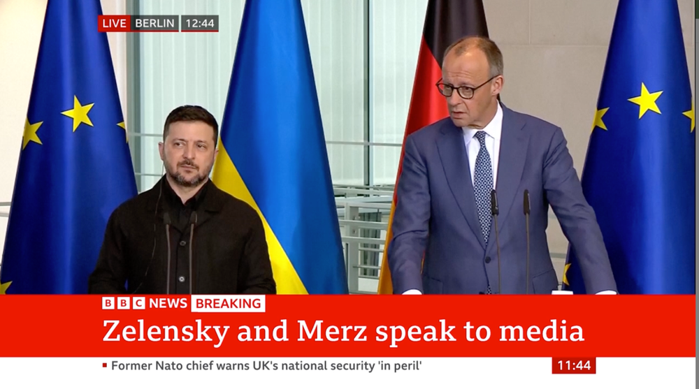 Zelensky and Merz speaking to the media on Tuesday (BBC News)