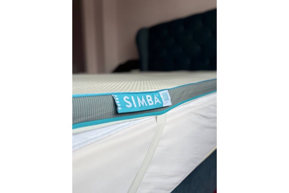 The topper, which is 6.5cm deep, cushioned my shoulders and hips brilliantly while remaining supportive (Sarah Jones/The Independent)