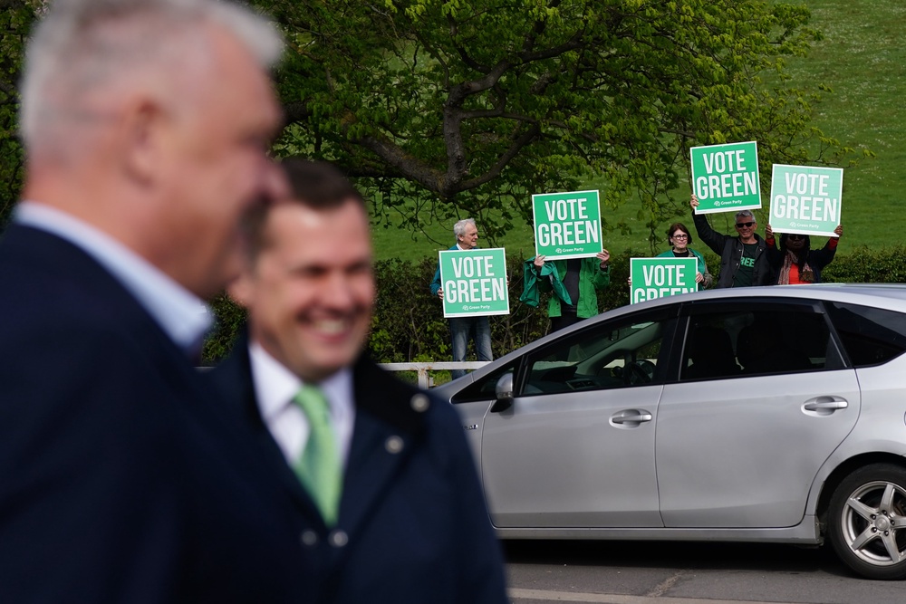 Green Party activists attended the forecourt (Jacob King/PA) (PA Wire)