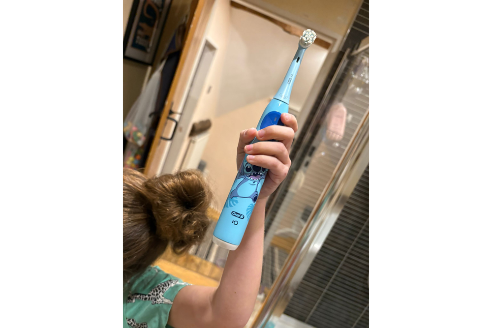 Our pint-sized tester was a big fan of her Disney Stitch electric toothbrush (The Independent)