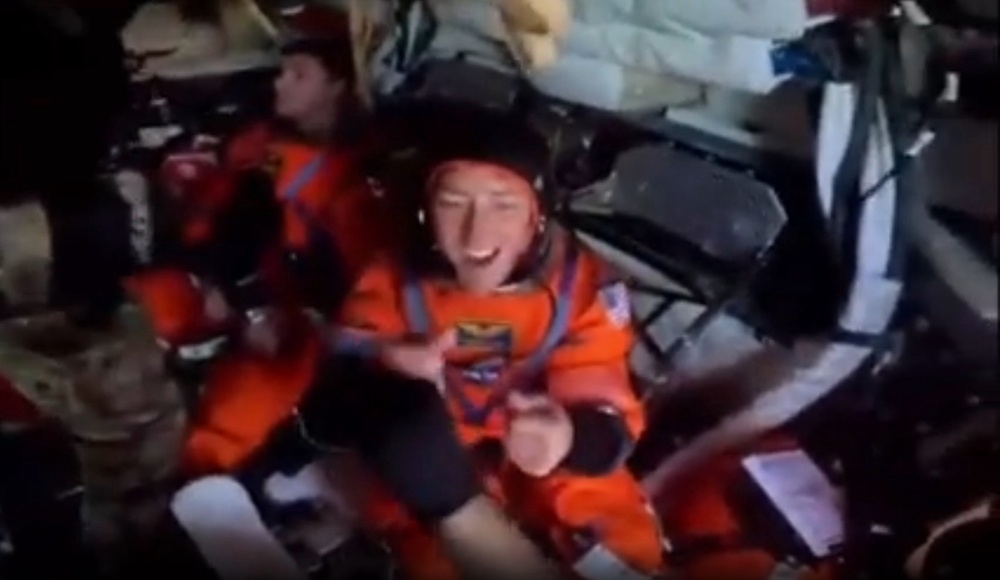 Christina Koch, a NASA mission specialist, double fist dumps U.S. Navy divers on Friday before the Artemis II crew is extracted from the Orion capsule (NASA)