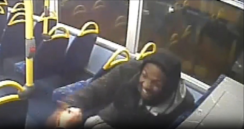 Dino Donaldson smiling on a bus after the killing (British Transport Police)