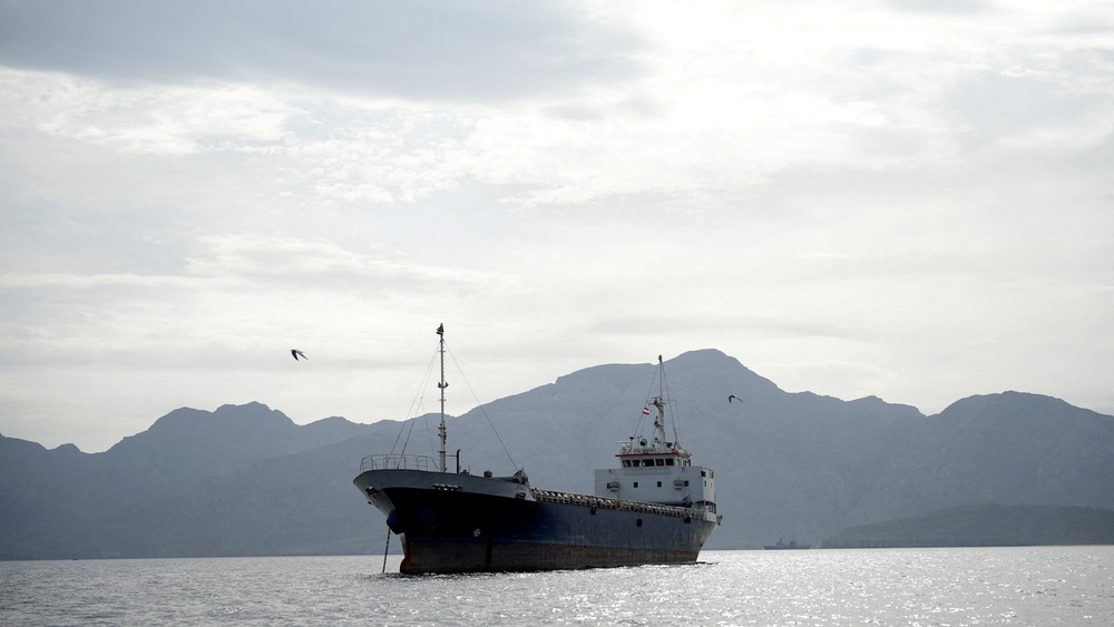 File. A vessel is seen in the Strait of Hormuz off the coast of Oman on 12 April 2026 (Reuters)