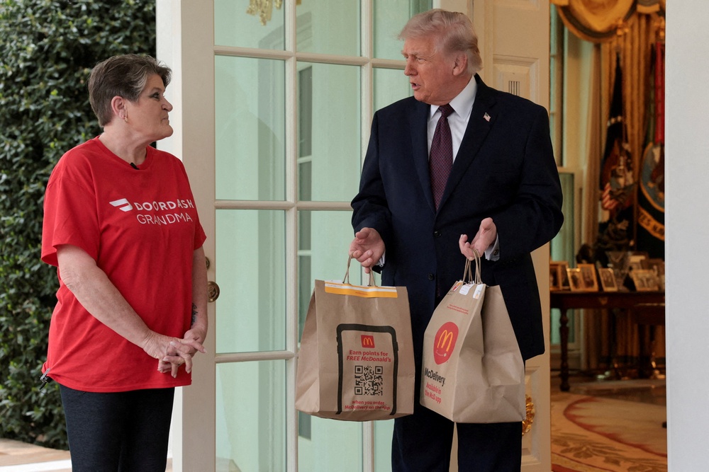 The president incredulously claimed that he thought the image showed ‘me as a doctor’ and blamed ‘fake news’ for comparing it to Jesus (REUTERS)