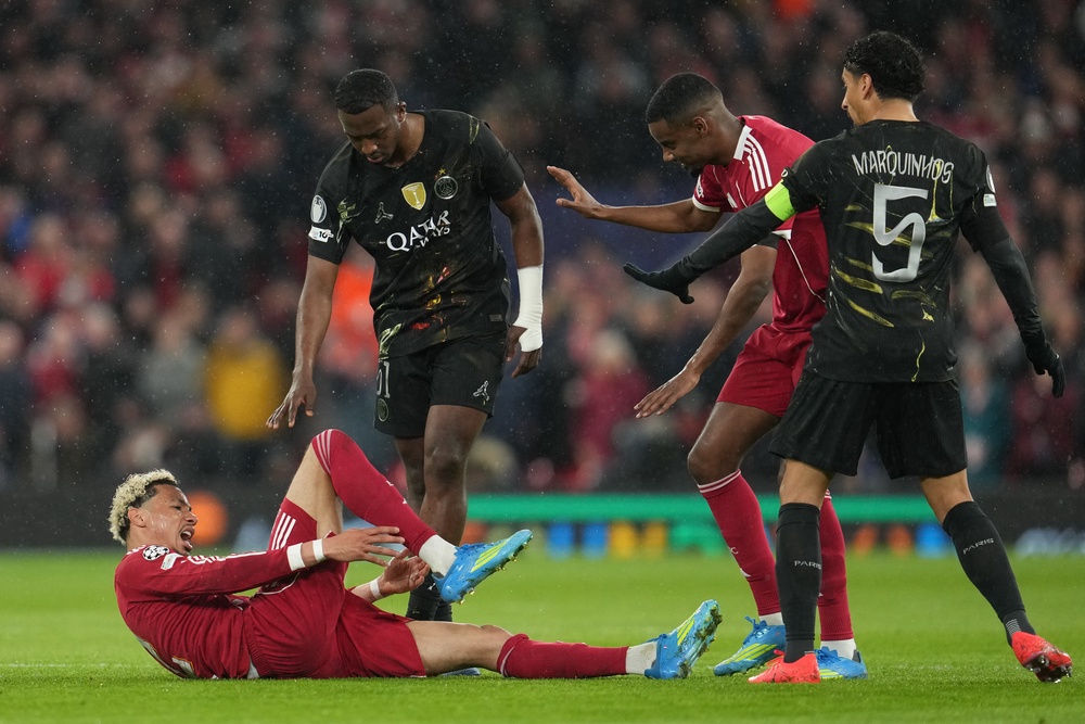 Hugo Ekitike went down off the ball and was stretchered off (AP)