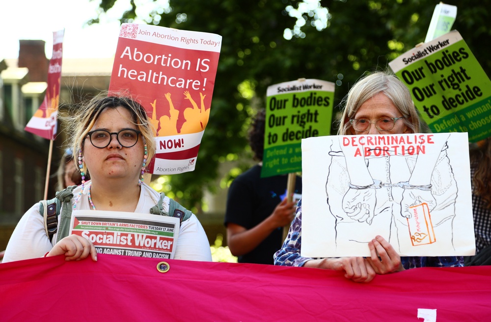 Protesters from pro-choice group 'Abortion Rights' gather near Parliament, as MPs voted on the decriminalisation of abortion on June 17, 2025 (Getty)
