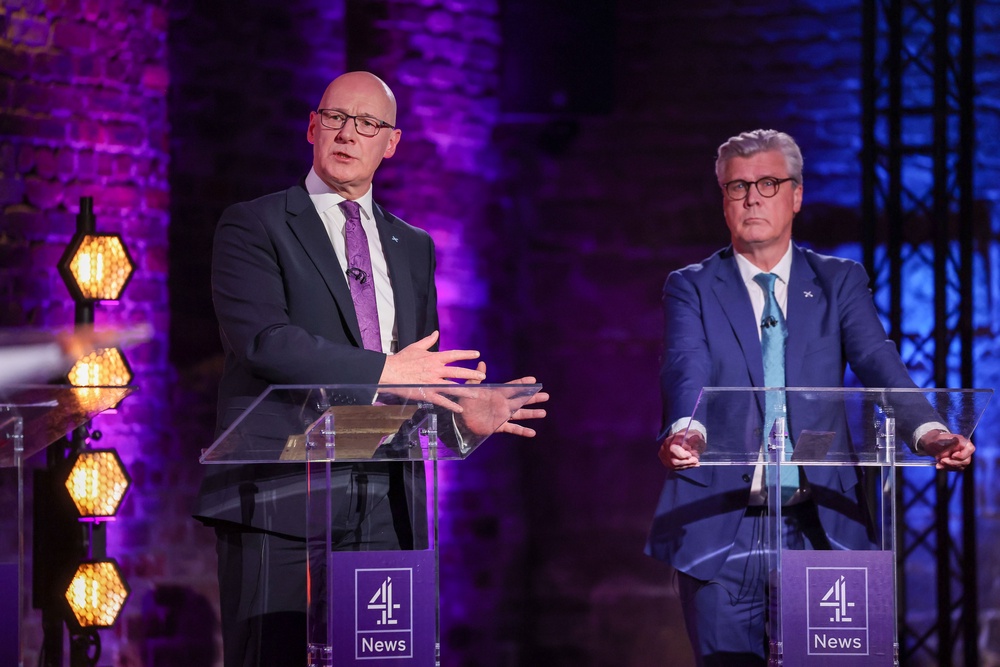 SNP leader John Swinney, left, said he wanted to ‘make sure Scotland’s energy was in Scotland’s hands’ (Robert Perry/PA) (PA Wire)