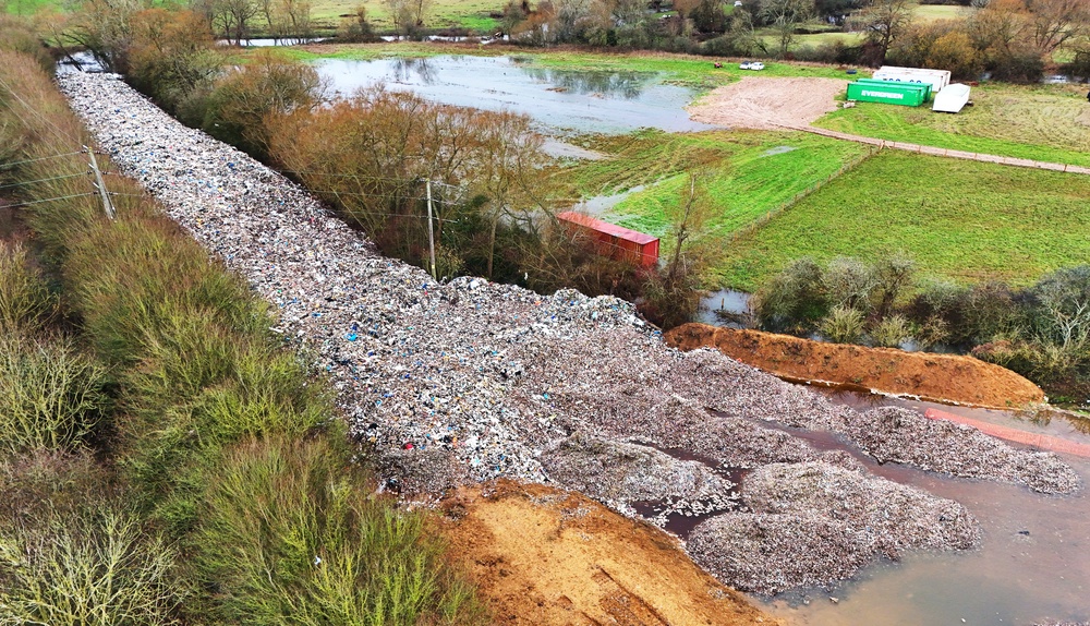 The 150m long mountain of rubbish – seen here before work began to clear it – prompted widespread outcry (Jonathan Brady/PA) (PA Wire)