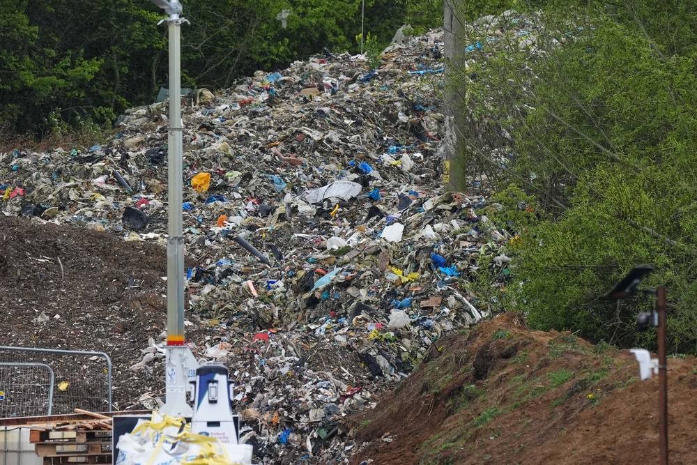 The illegal waste pile includes commercial and household rubbish (Jacob King/PA) (PA Wire)