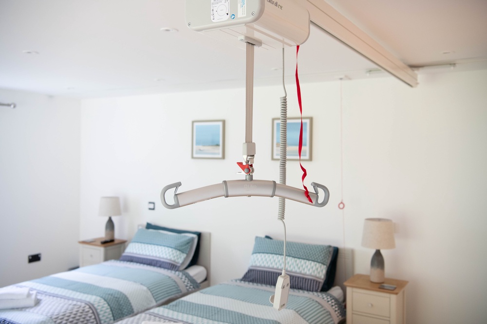 Chestnut Cottage has a modern room equipped with a ceiling track hoist system (The Olde House)