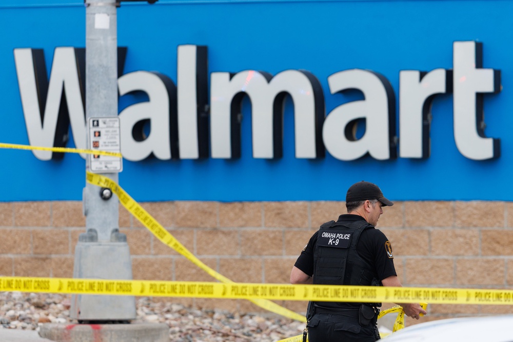 Investigators say the incident began inside the store, where the suspect approached a woman and a 2- or 3-year-old boy (Omaha World-Herald)