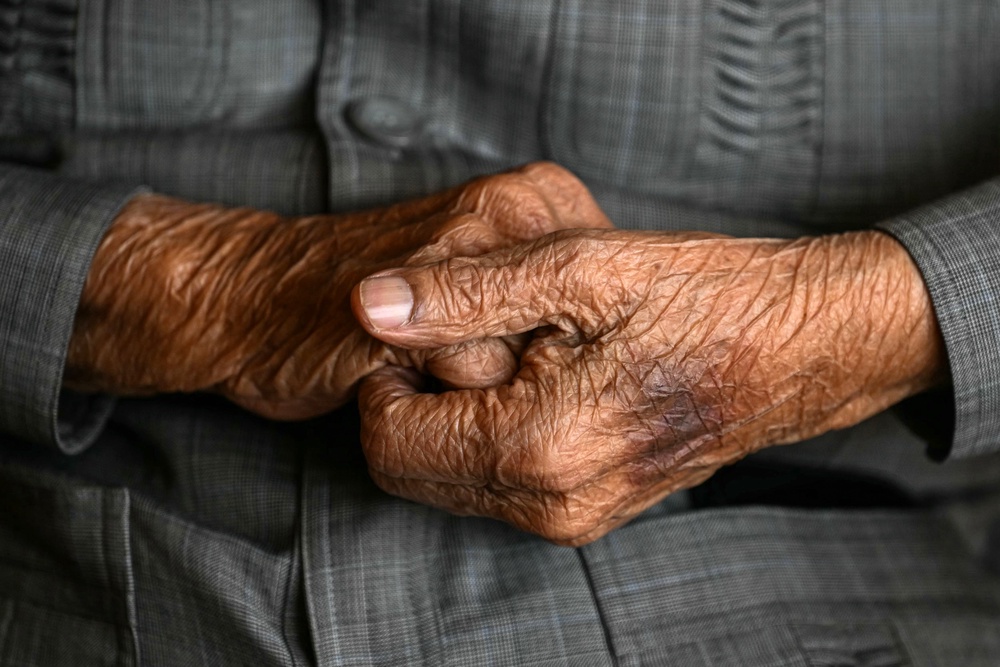 Malaysia's former prime minister Mahathir Mohamad holding his hands (AFP/Getty)