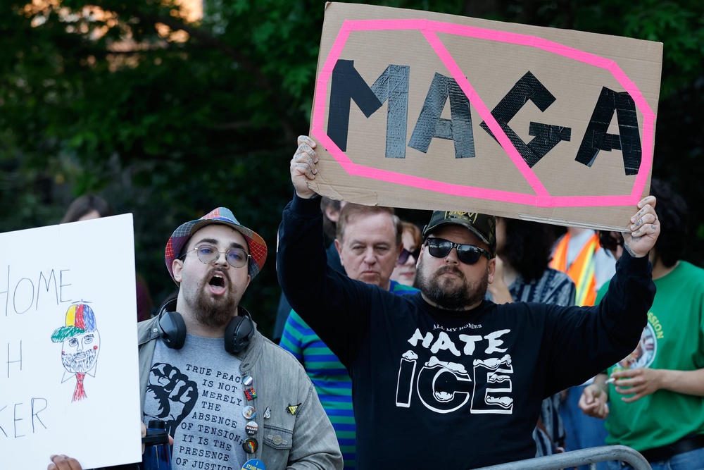 People protest outside the arena where Vice President JD Vance spoke at a Turning Point USA tour stop at the University of Georgia (AP)