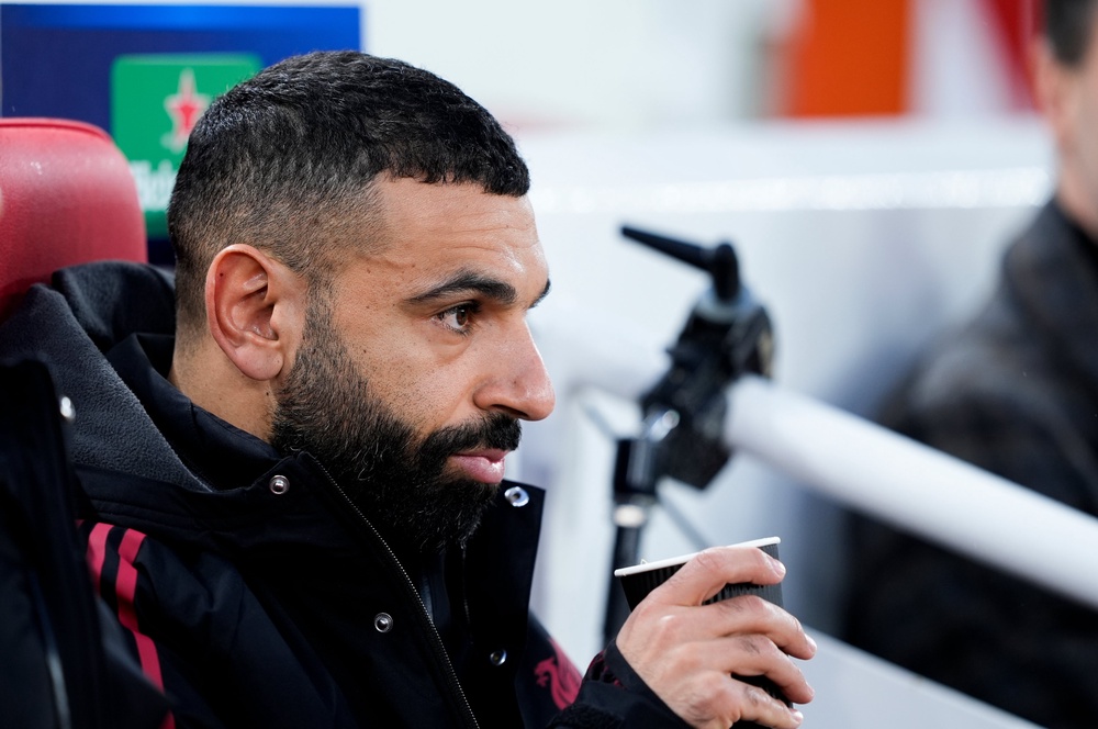Jamie Carragher did not believe Slot benched Salah because of a grudge (PA)