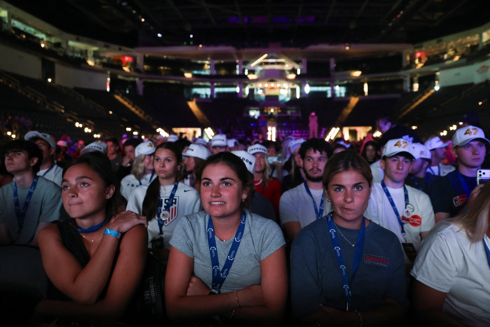 People listen to US Vice President JD Vance during the This is the Turning Point Tour at the University of Georgia (Reuters)