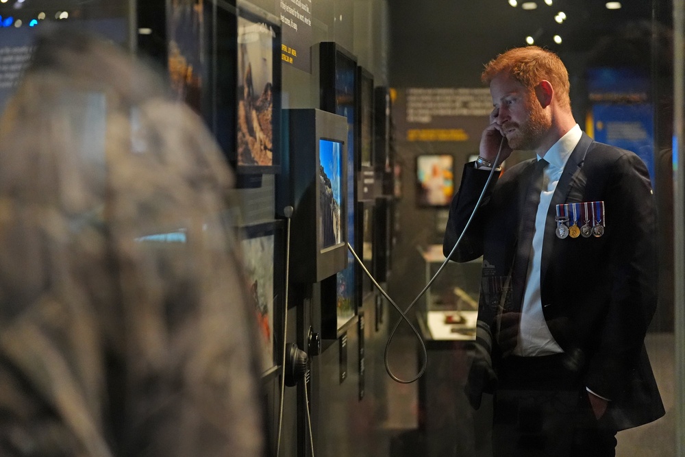 The Duke of Sussex engaged with an interactive display in the at the Australian War Memorial (Jonathan Brady/PA) (PA Wire)