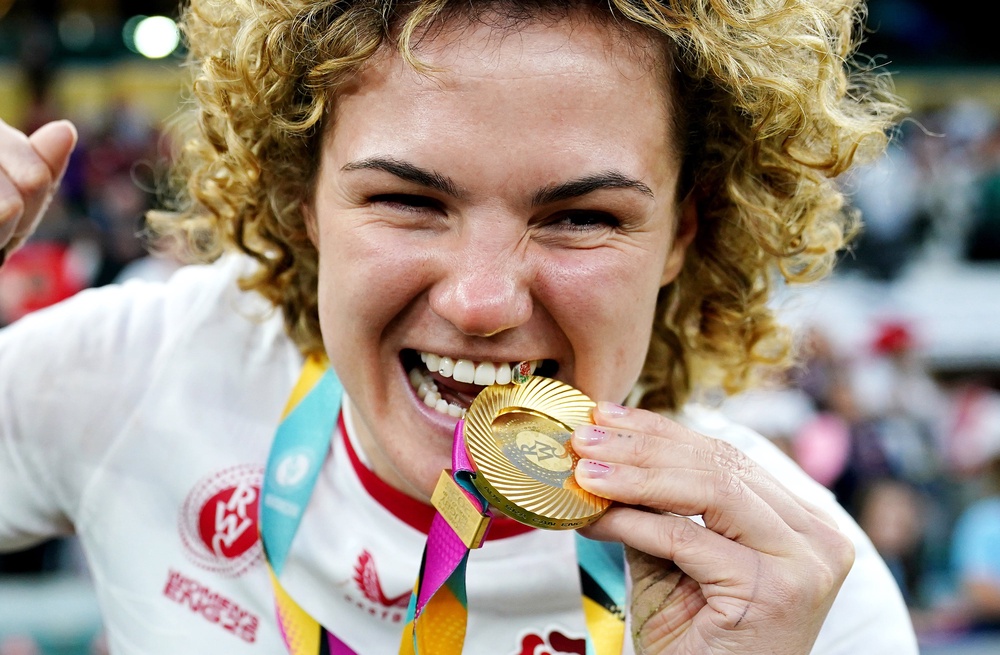 Kildunne bites her World Cup winner’s medal (Ben Whitley/PA) (PA Wire)