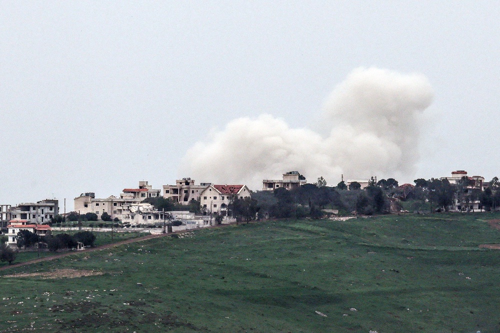 A photograph taken from the Israeli side of the border with Lebanon shows smoke billowing from southern Lebanon (AFP/Getty)