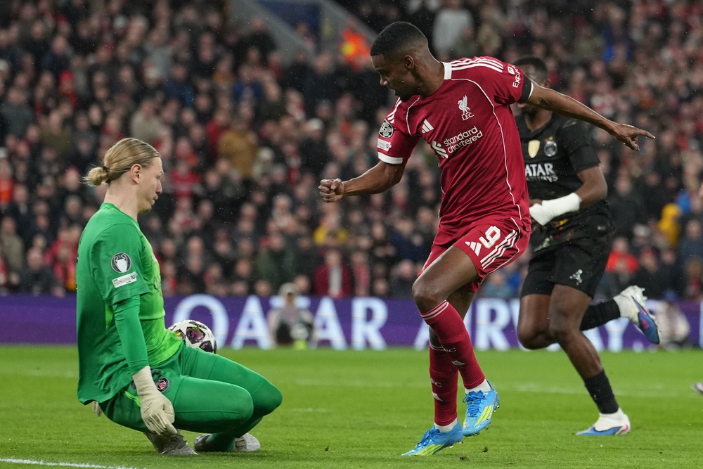 PSG's goalkeeper Matvey Safonov saves in front of Liverpool's Alexander Isak (AP)