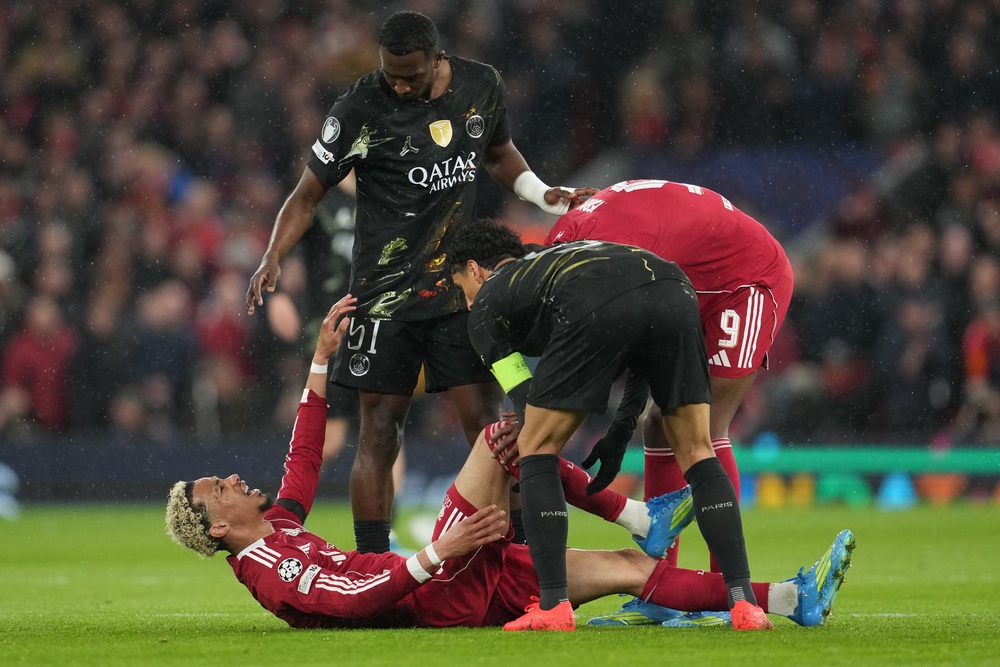 Hugo Ekitike reacts after a serious injury against PSG (AP)