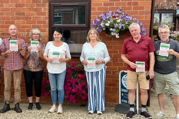 Michele Franks, centre, and other residents in Lincolnshire oppose plans for a new factory farm (CAFF)