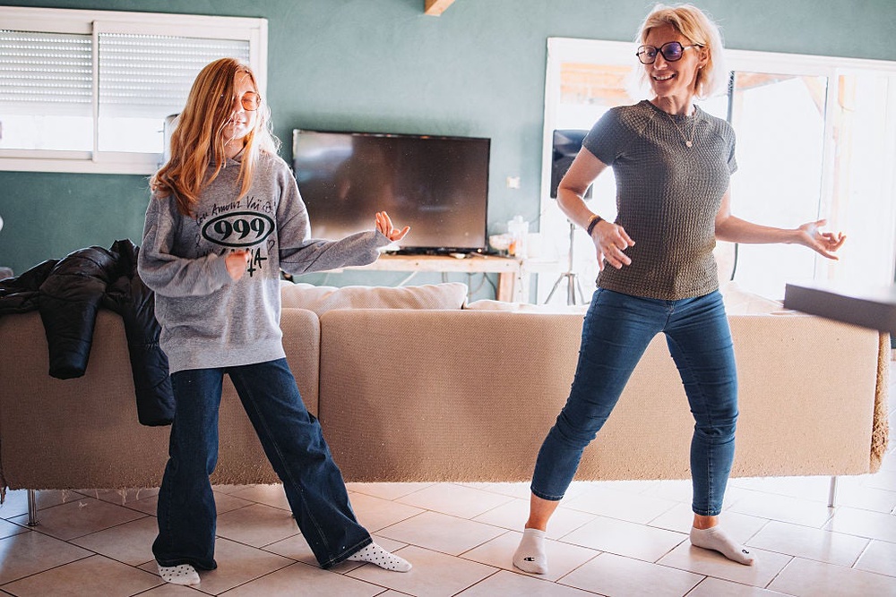 Relationships can last decades, but a couch? Not so much, which is why intentional spending emphasizes what’s important to you - like family time - and de-emphasizes the exhausting pursuit of the latest home trends (Hans Lucas/AFP via Getty Images)