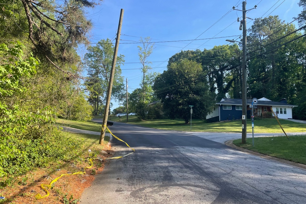 Crime scene tape is tied around a pole near the site where Lauren Bullis was killed (RJ Rico/AP) (AP)