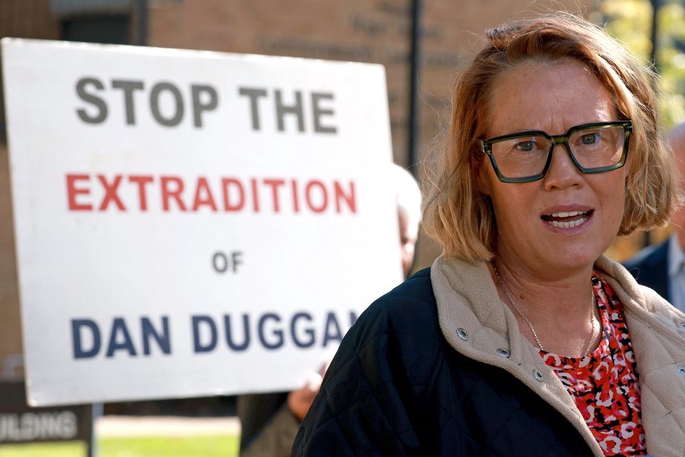 Saffrine Duggan, the wife of Daniel Duggan, talks to the media outside the Federal Court of Australia in Canberra. (AFP/Getty)