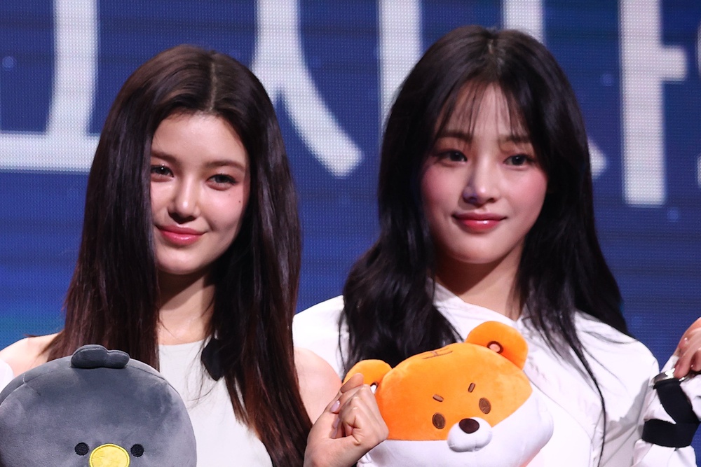 Danielle (left) is no longer with the group amid an ongoing legal dispute, while Minji remains in discussions with the label (Getty Images)