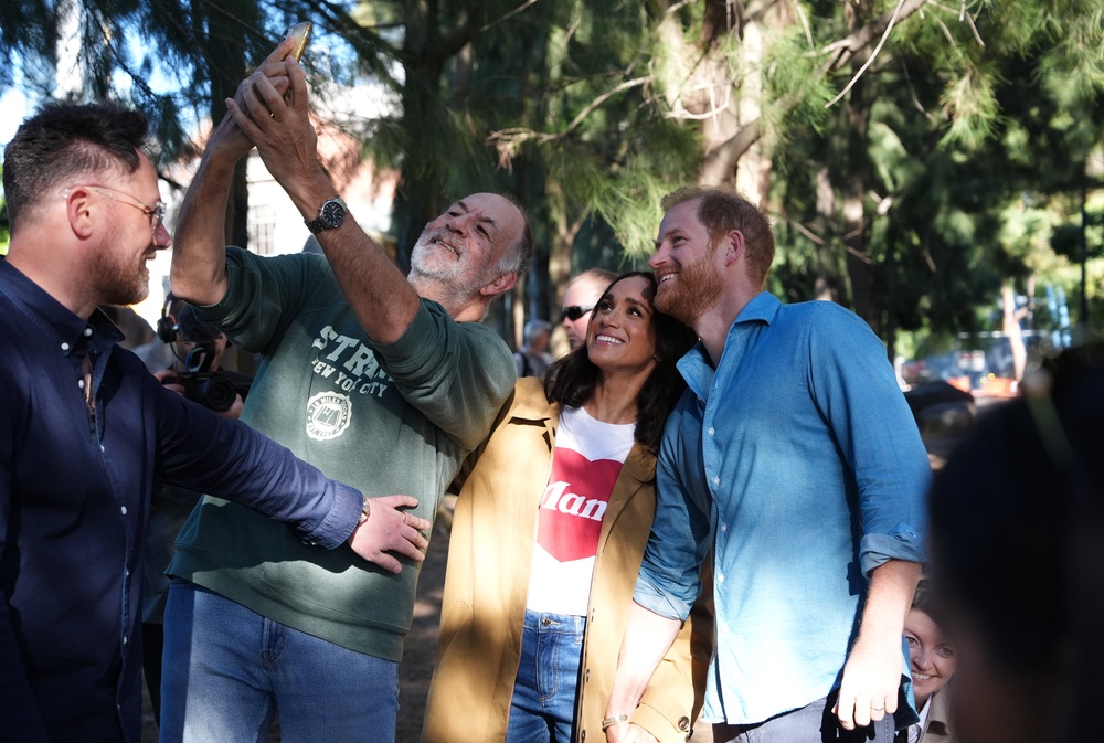 The Duke and Duchess of Sussex pose for a selfie at the Scar Tree Walk in Melbourne (PA)