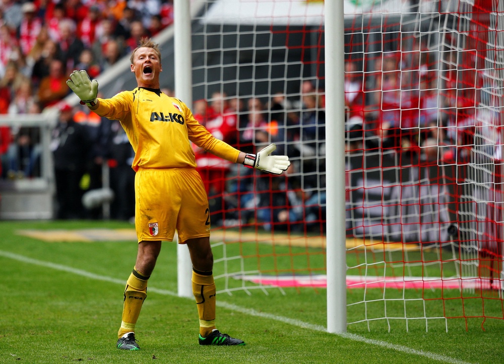 Alex Manninger played for Augsburg between 2012 and 2016 before finishing his career in a non-playing capacity at Liverpool (Reuters)