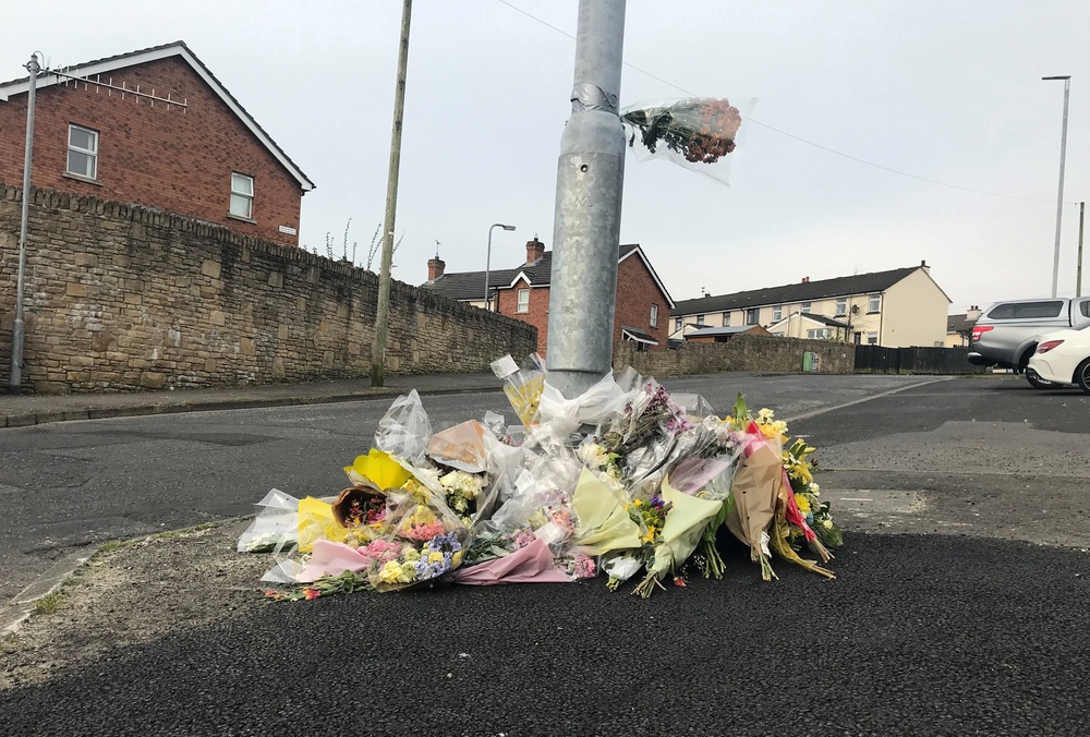 Flowers at the spot where Lyra McKee was killed in Creggan, Londonderry (PA) (PA Archive)
