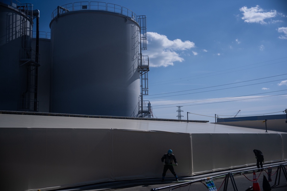 Water storage tanks set to be dismantled are visible at the Fukushima Daiichi nuclear power plant, operated by Tokyo Electric Power Company (TEPCO), in Okuma, Fukushima (Associated Press)