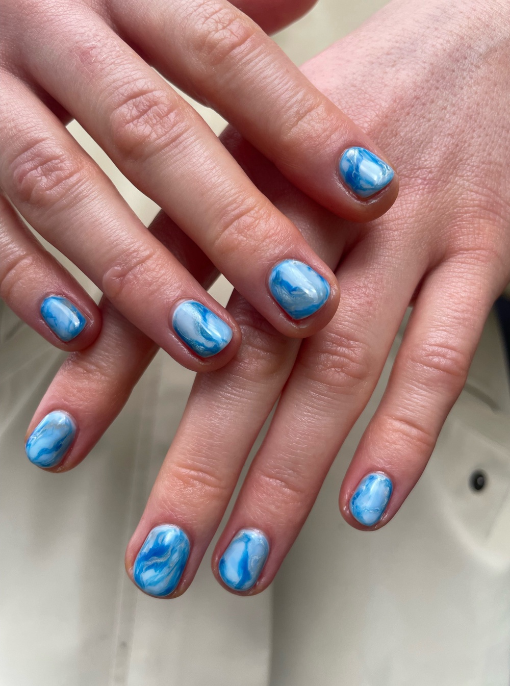 Ocean blue blooming gel nails by Hannah at Shoreditch Nails (Shoreditch Nails/PA)