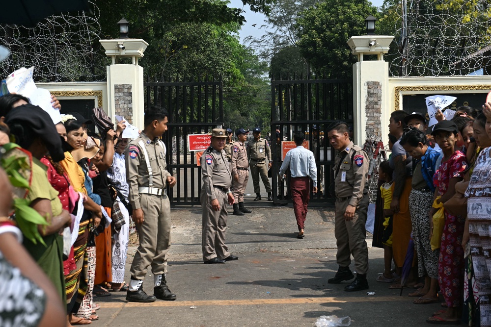 Relatives wait outside Insein Prison for the release of prisoners as part of an amnesty to mark Myanmar's new year in Yangon (AFP/Getty)