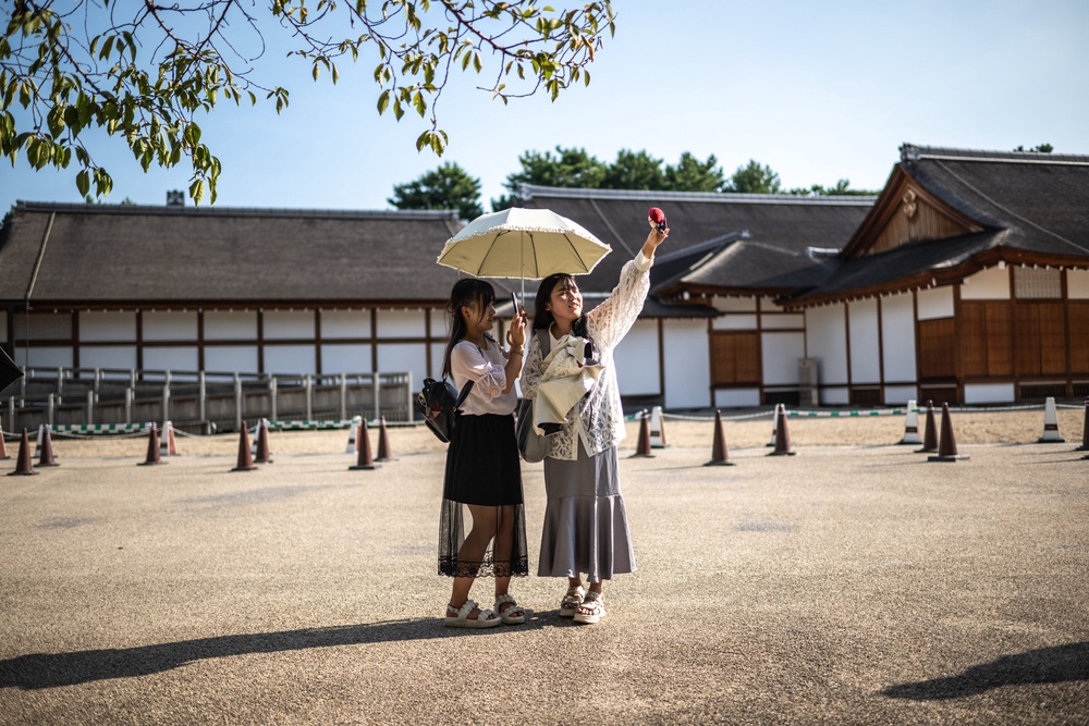 People visit the Nagoya Castle on a hot day amid a heatwave in Japan (AFP/Getty)