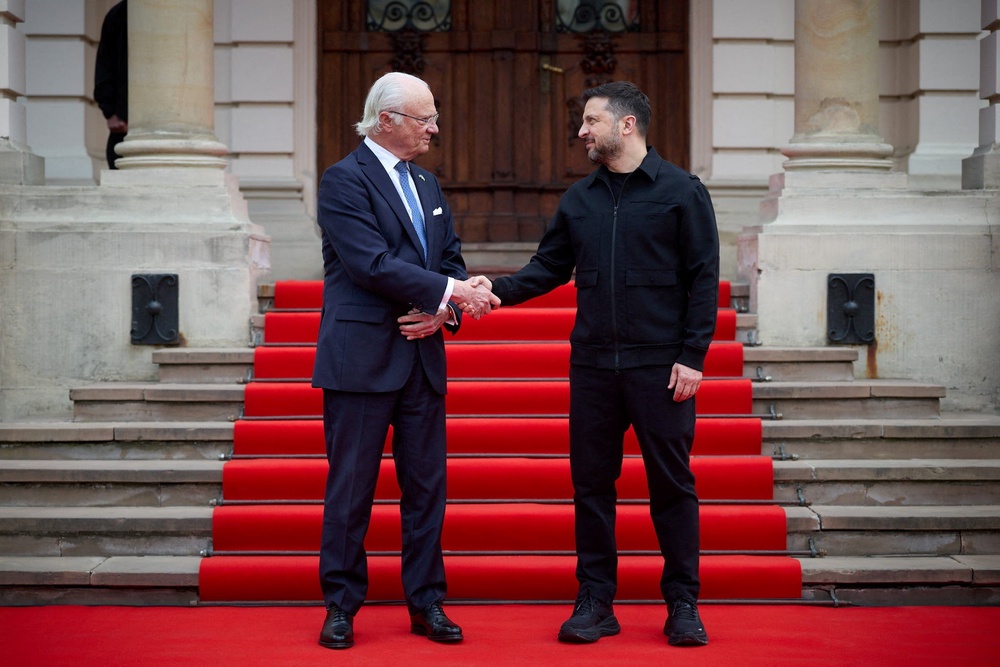 Sweden's King Carl XVI Gustaf and Ukraine's President Volodymyr Zelenskiy shake hands before a meeting, amid Russia's attack on Ukraine, in Lviv, Ukraine April 17, 2026. (Reuters)