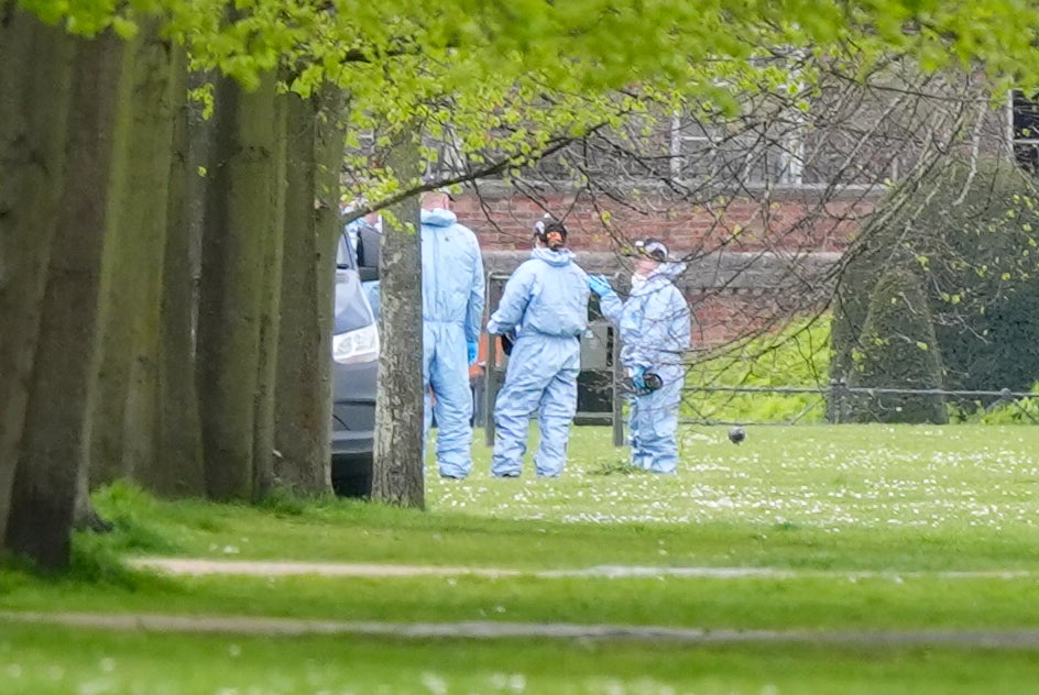 Police in Kensington Gardens on Friday (PA)