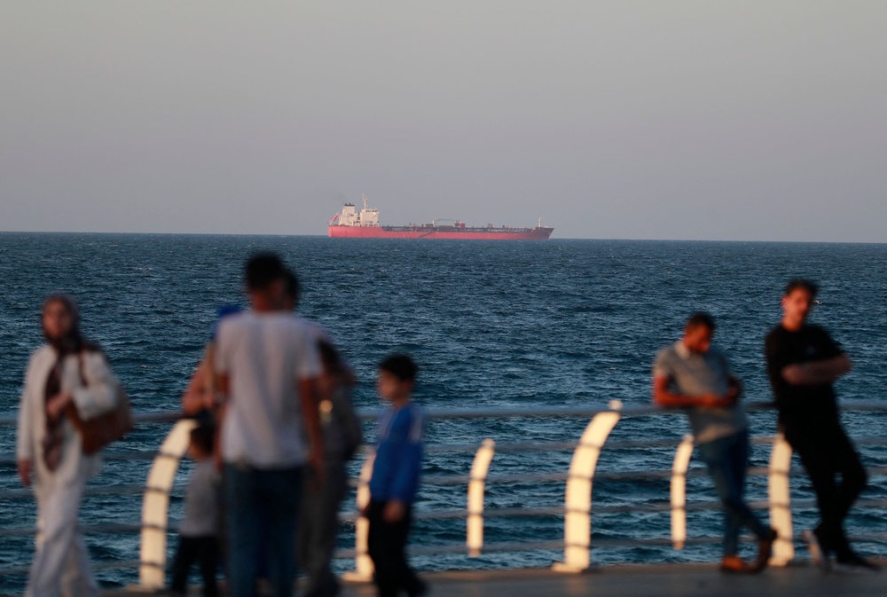 Walid Shaker says running along the Corniche at Manara offers him some respite from the drones (AFP/Getty)
