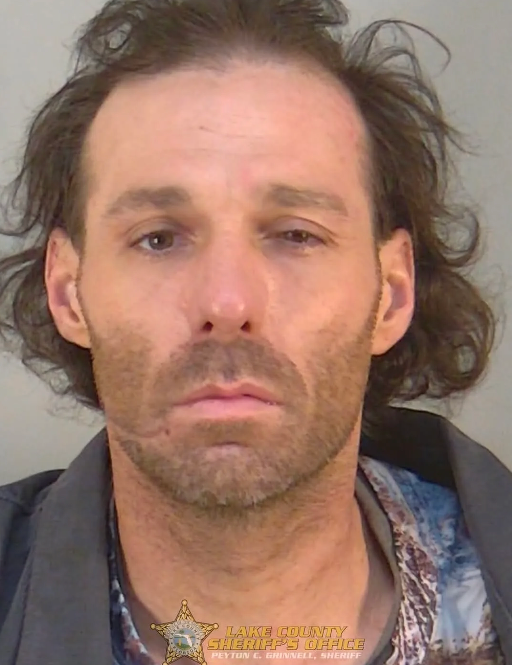 Matthew Lee Pasco, 43, allegedly tried to shoot a dog that was attacking a woman but instead fatally shot the animal’s owner, police say (Lake County Sheriff’s Office)