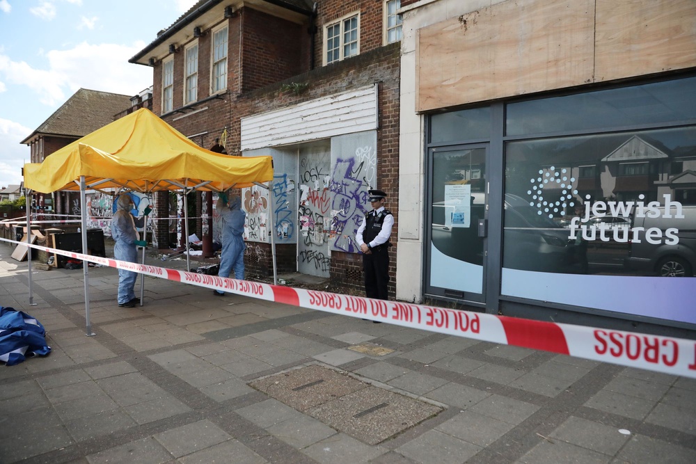Police forensic officers investigate the scene (Getty Images)