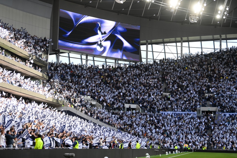 Spurs fans cheer on their team before facing Brighton. (Getty Images)