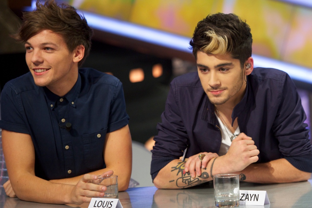 Louis Tomlinson and Zayn Malik pictured together in 2012 (Getty Images)