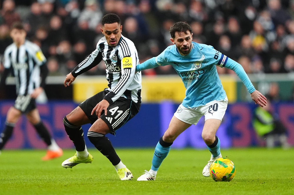 Bernardo Silva, right, has has scored 76 goals and made 77 assists in 451 appearances for Manchester City (Owen Humphreys/PA)