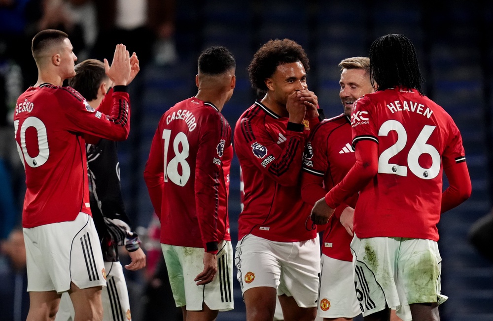 Manchester United celebrated a huge win in their fight for a top-five finish (John Walton/PA) (PA Wire)
