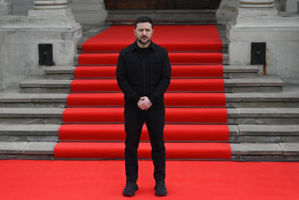 Ukraine's president Volodymyr Zelensky waits to welcome Swedish king in Lviv on 17 April 2026, amid the Russian invasion of Ukraine (AFP via Getty Images)