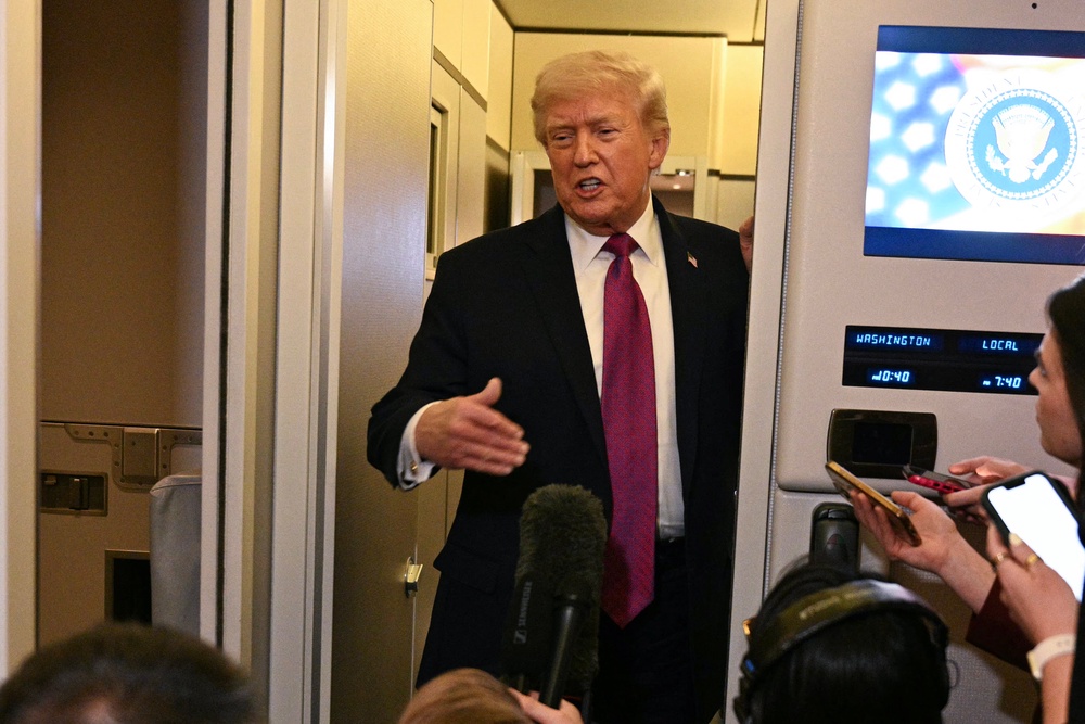 US president Donald Trump speaks to the press aboard Air Force One before arriving at Joint Base Andrews in Maryland on 17 April 2026 after a two-day trip to Nevada and Arizona (AFP via Getty Images)