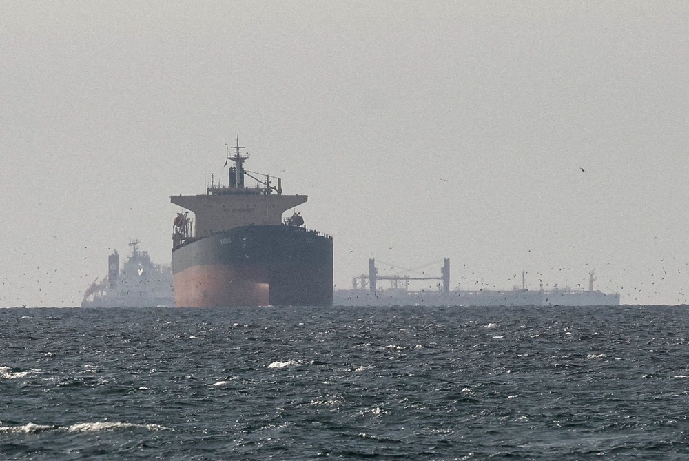 Cargo ships in the Gulf, near the Strait of Hormuz. An oil tanker was fired upon by an IRGC vessel early Sunday in the Strait of Hormuz. (Reuters)